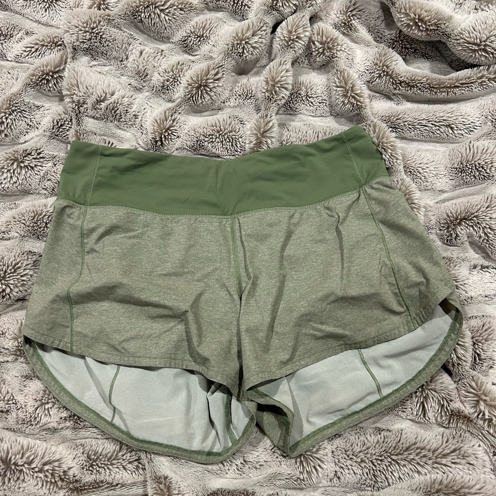 green lululemon shorts